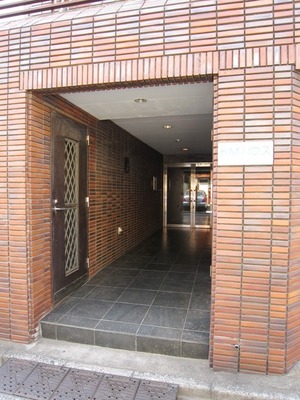 Entrance. It is old-fashioned building of tiled. 