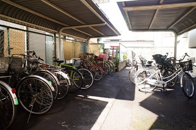 Other common areas. Bicycle parking lot with a roof is also safe on a rainy day