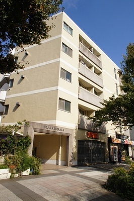 Building appearance. Stylish appearance is pale yellow tiles