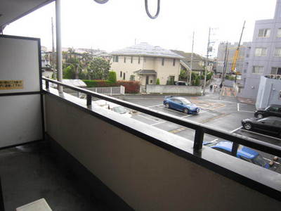 Balcony. It is a photograph of the same type of room. 