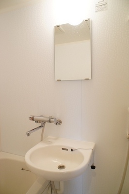 Washroom. Wash basin is located in the bathroom