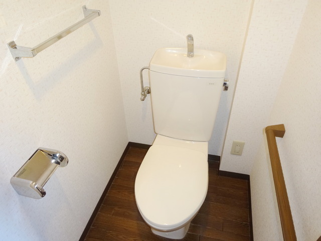 Toilet. Wide toilet of size wheelchair enters