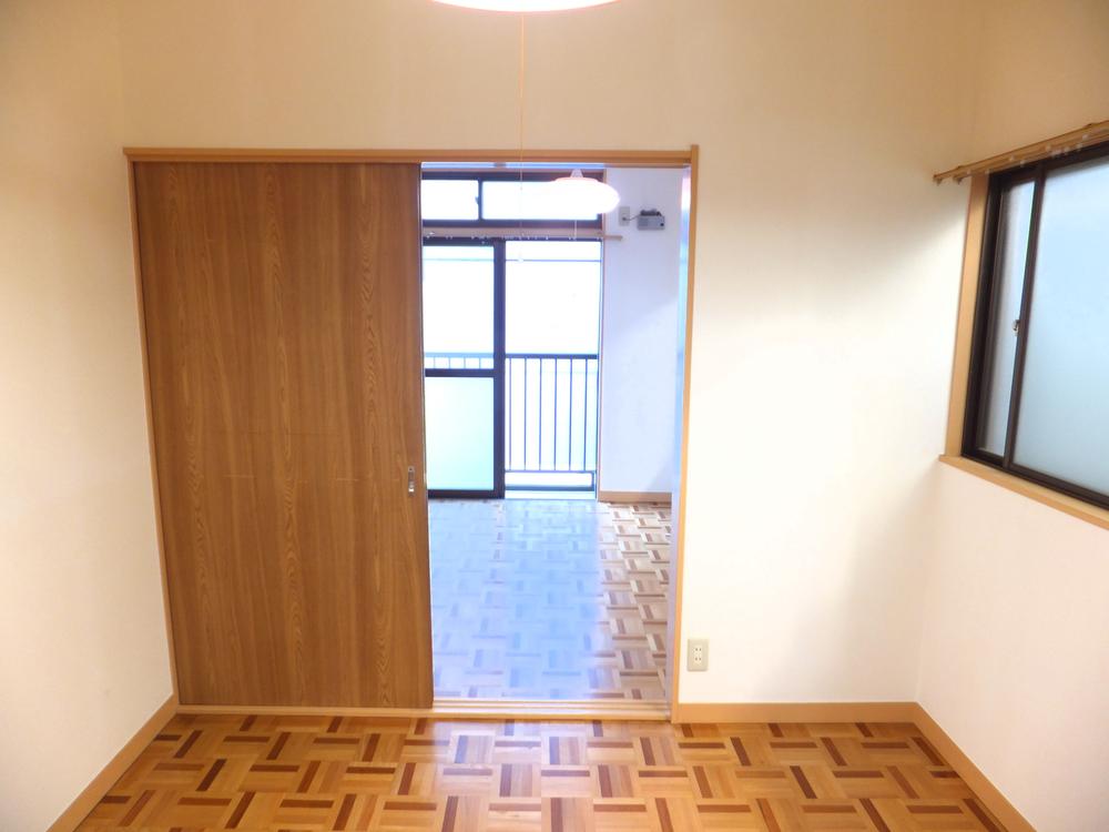 Non-living room. It contains the bright sunlight from the balcony.