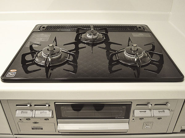 Kitchen.  [Glass top 3-burner stove]  The beauty of the glass, The strength to withstand the shock and scratches was plus.