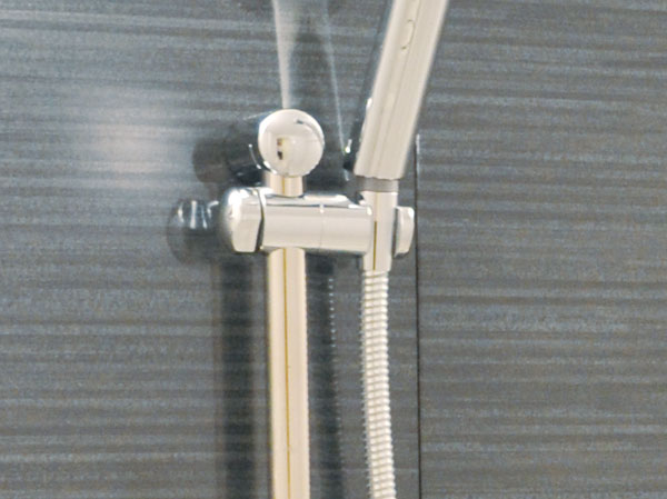 Bathing-wash room.  [Shower slide bar]  Adopt a shower slide bar that you can freely adjust the height and angle of the shower at the position of preference.