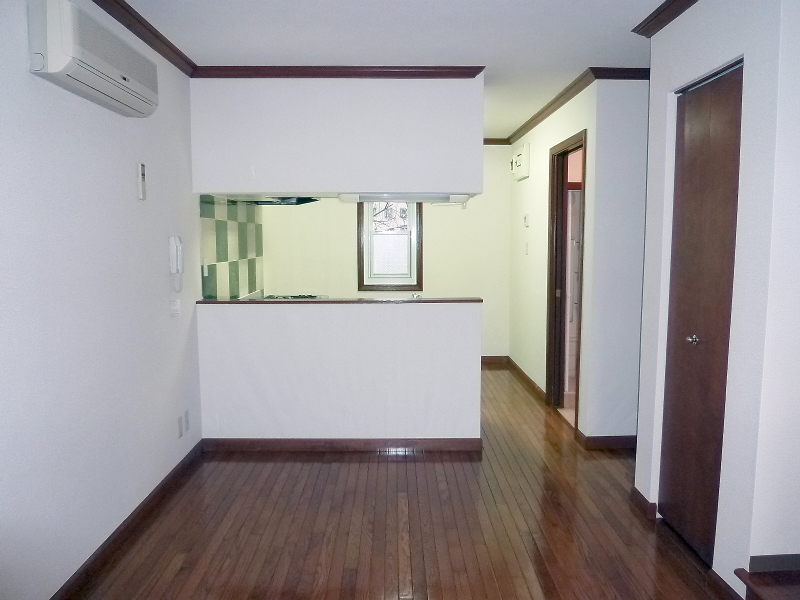Living and room. It is air-conditioned. Flooring shiny