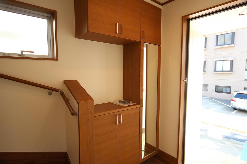 Entrance. I open the front door, There are, , , , , ,