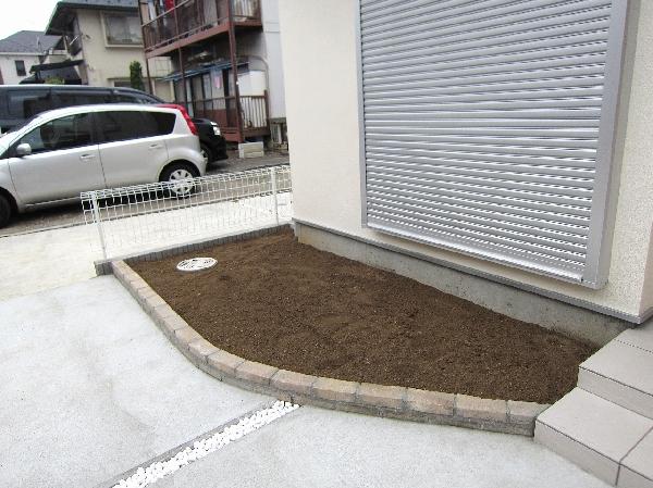 Garden. There is a small garden in front of the entrance.