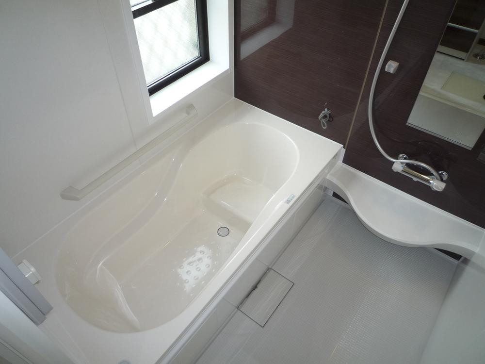 Bathroom. Unit is a bus with a bathroom ventilation dryer. 