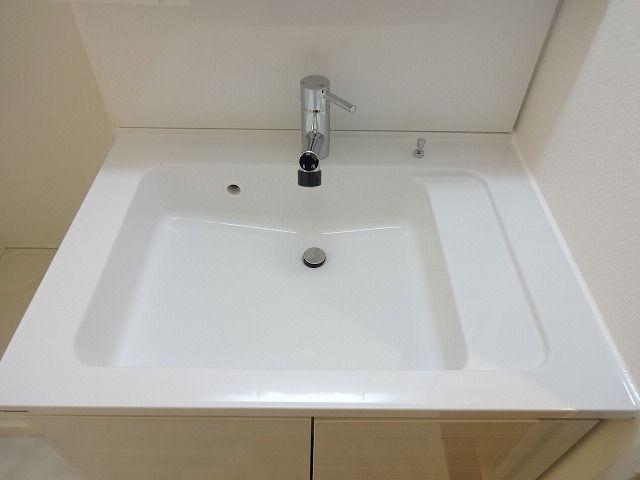 Wash basin, toilet. Bathroom vanity