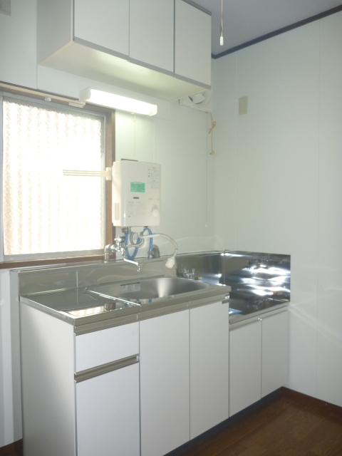 Kitchen. There is a window in the kitchen.