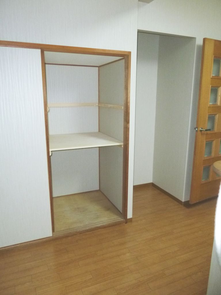 Kitchen. Dedicated yard refrigerator fits easily into (right) and kitchen storage (left)