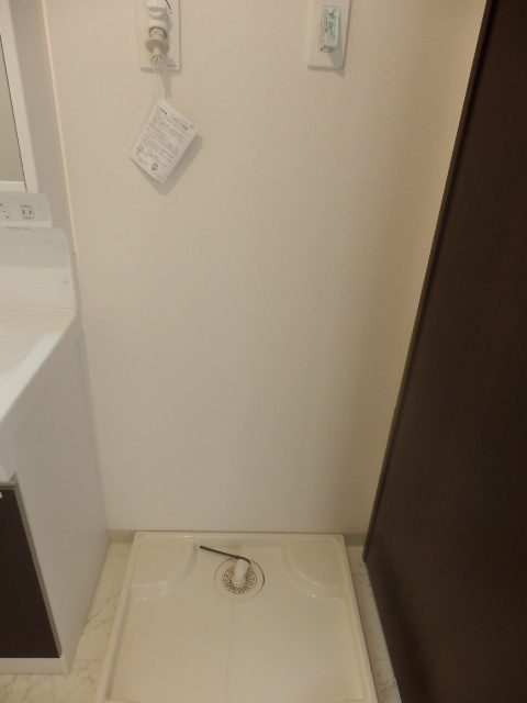 Other Equipment. Washing machine in the room
