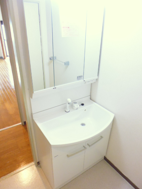 Washroom. It is a photograph of another in Room