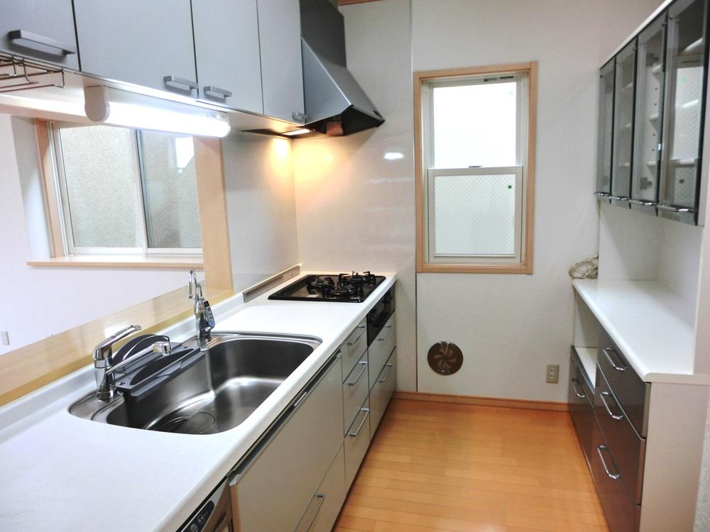 Kitchen. Cupboard kitchen! Because it housed plenty, Mom also smiling