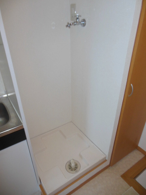 Other Equipment. Washing machine tub in the room