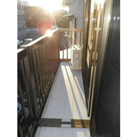 View. Wide balcony that spans two rooms.