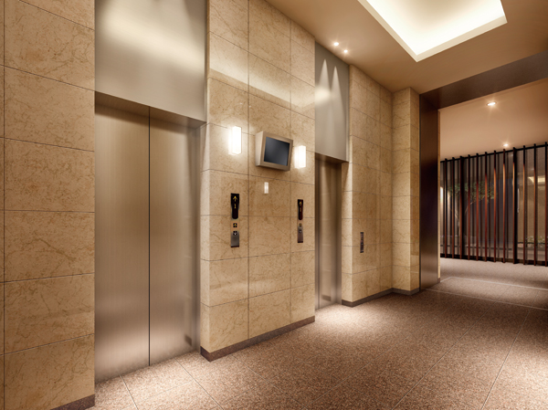 Features of the building.  [First floor elevator hall] Is calm attire that nestled the walls and chic carpet woodgrain, While illuminated by the soft light of the down light, It makes an air atmosphere and pleasant tranquility, full of grace. (Rendering)