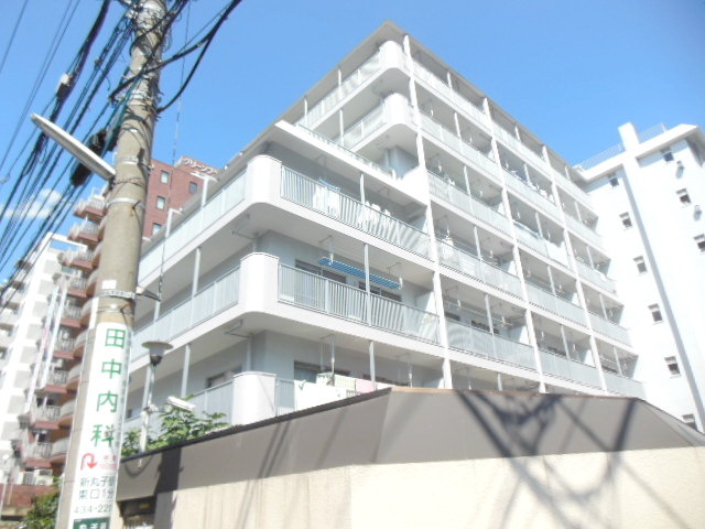 Building appearance. Caretaker day shift at the condominium type
