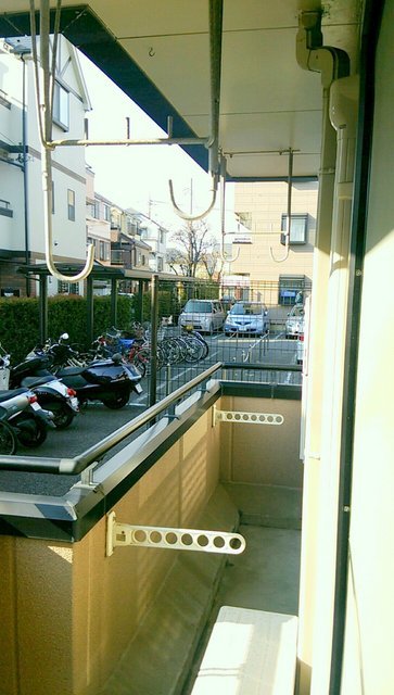 Balcony. A lot of washing Hoseru balcony