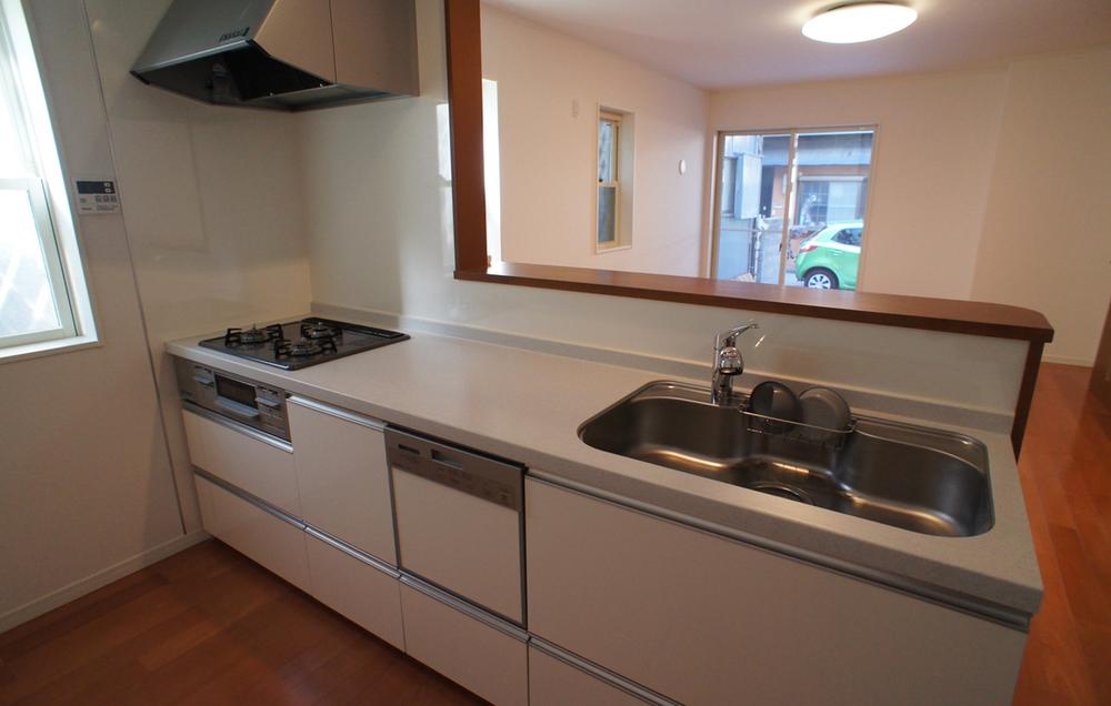 Kitchen. Because you are not wearing a cupboard hanging on the front, There is a feeling of opening