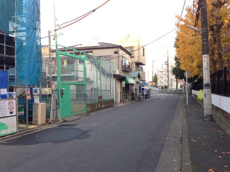 Local photos, including front road. Front road 7m Garage entrance Ease