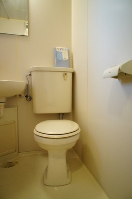 Toilet. 3-point unit is the bathroom