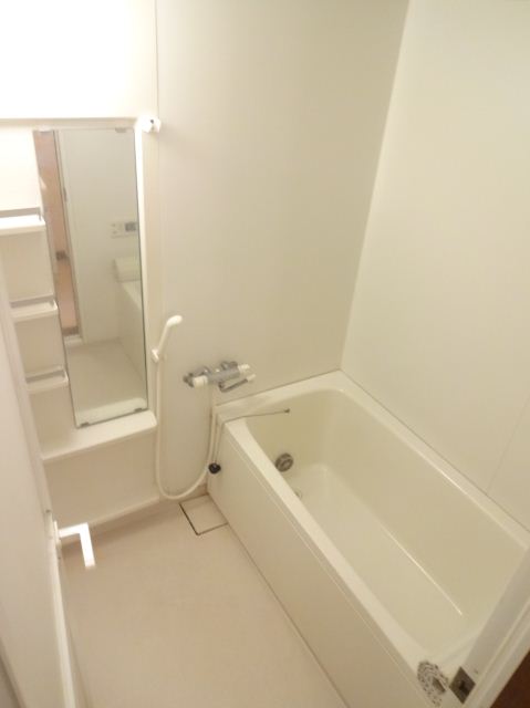 Bath. Large cupboard