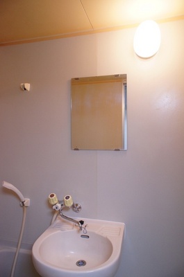 Washroom. Wash basin is located in the bathroom. 