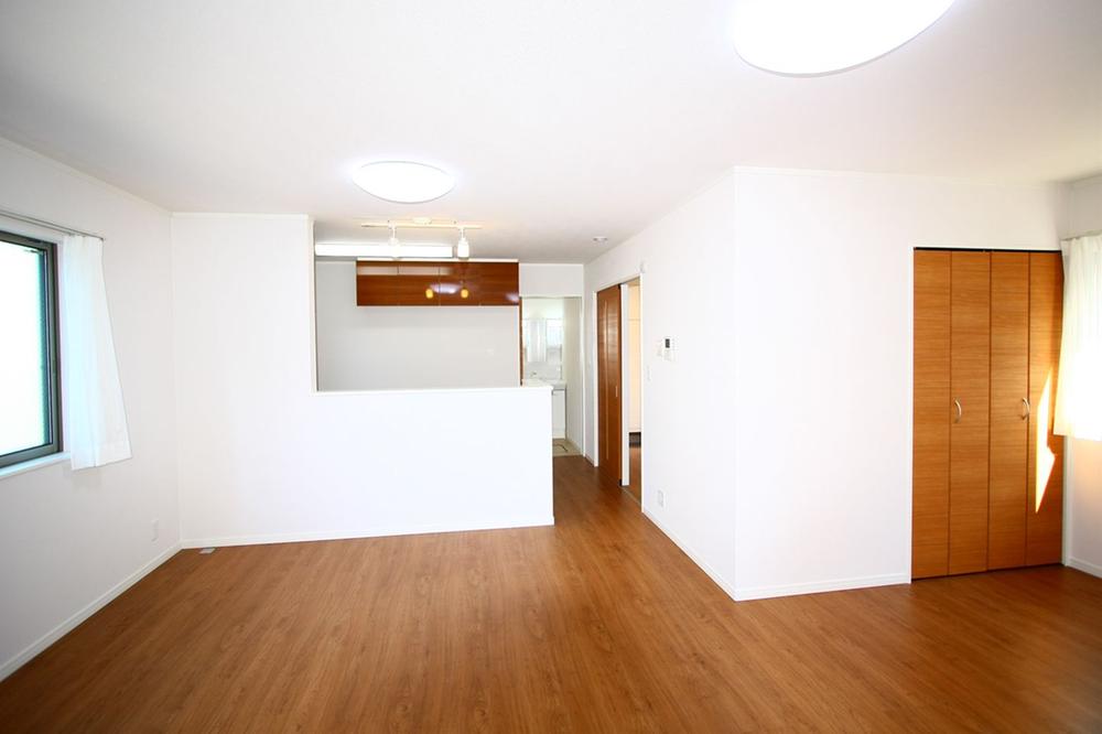 Living. South side is bright first floor LDK indoor and love in the parking lot spaces.