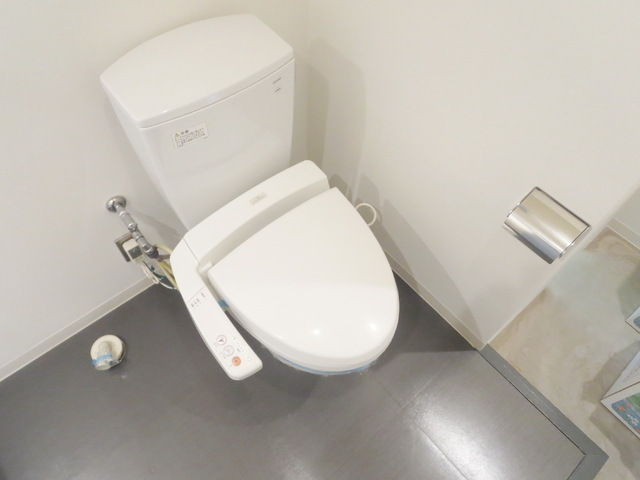 Toilet. Toilet is equipped with a convenient Washlet