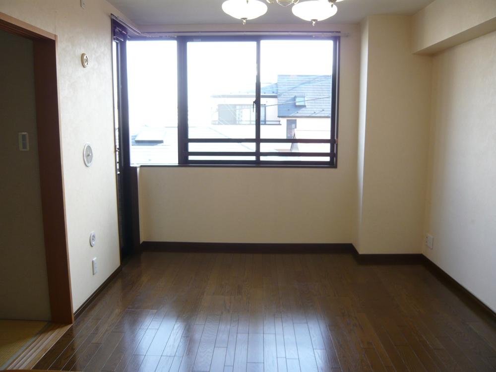 Living. It is a living-dining viewed from the counter.