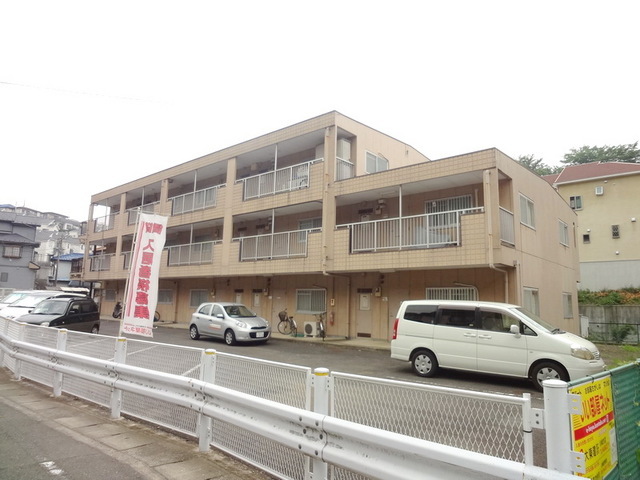 Building appearance. Of the three-story apartment