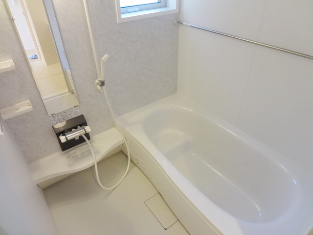 Bath. Bright, a clean bathroom with a window