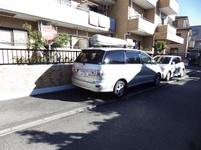 Parking lot. Parking space for customers there are two cars.