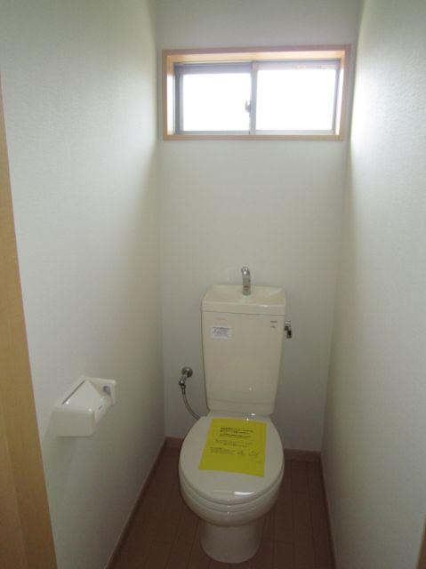 Toilet. If there is a window is bright toilet.