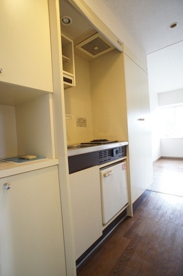 Kitchen. It is with a mini-fridge in the kitchen!