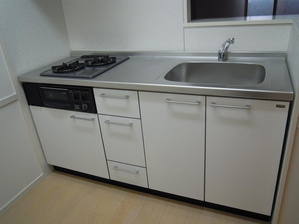 Kitchen. With two-burner grill system Kitchen