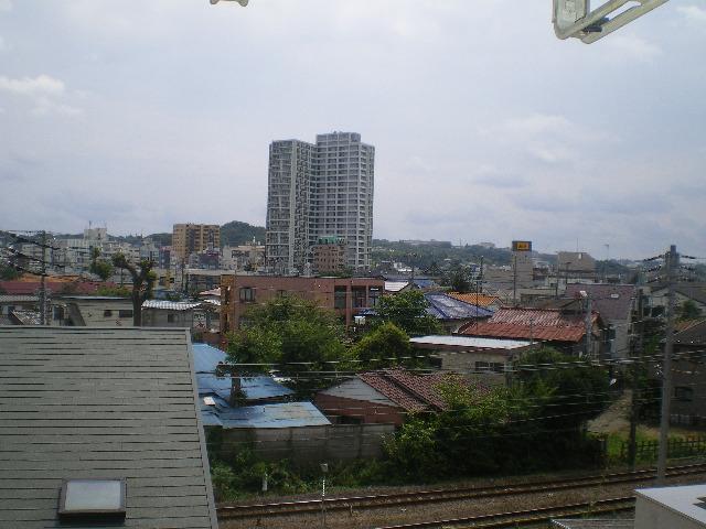 View photos from the dwelling unit. The south side of the view. There is a sense of relief there is no large building.