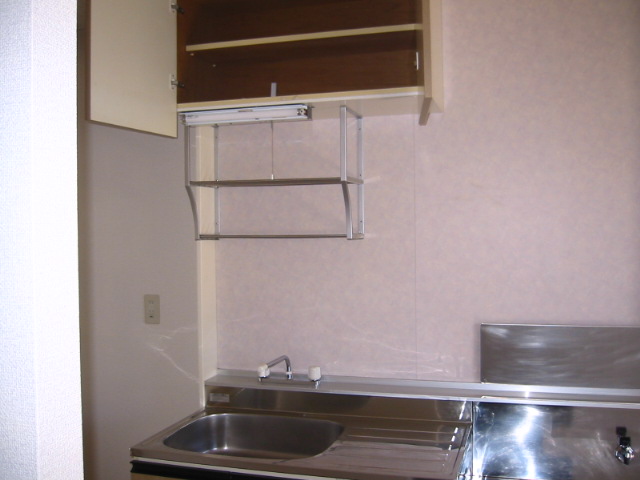 Kitchen. Shukugawara real estate apartment for rent security surface relief of the room