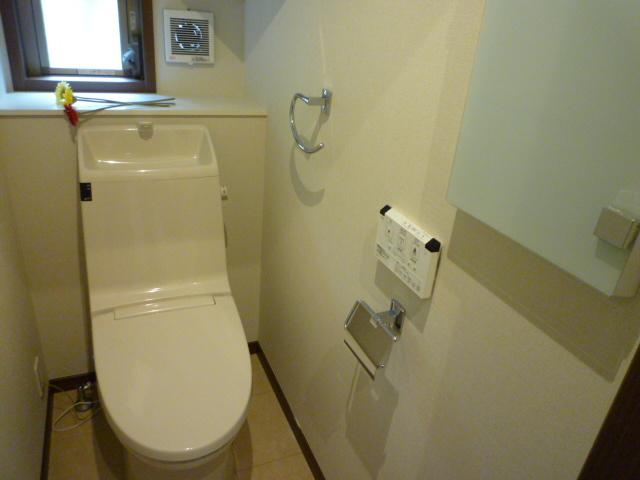 Toilet. Toilets are equipped with washing machines in two locations provided