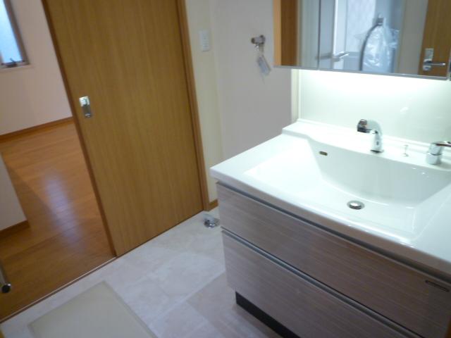 Wash basin, toilet. Wash basin, Water around the kitchen is easy to clean with marble tile