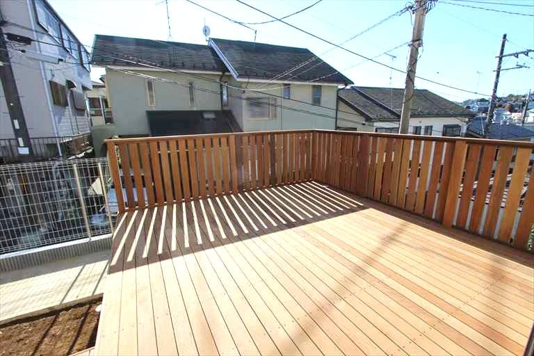 Garden. 1 Building south side wood deck