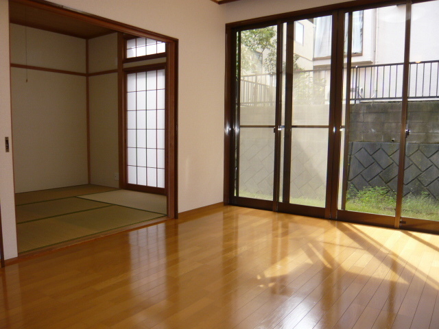 Living and room. Western-style warm sun coming through the large windows