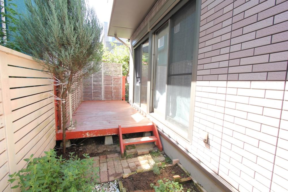 Garden. There is a wood deck is an extension of the living room. 2013 September shooting