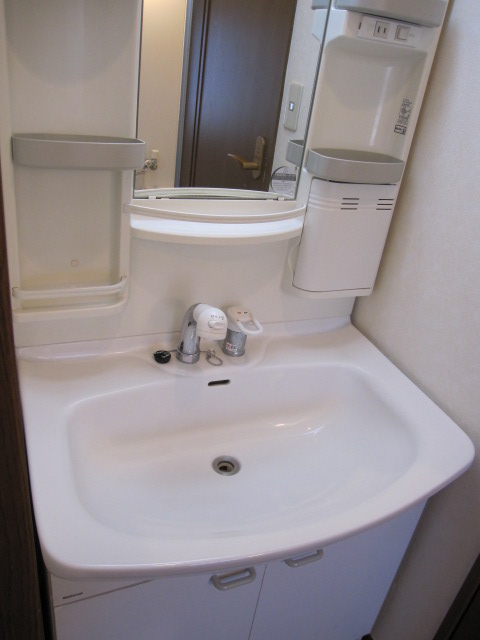 Washroom. Mukogaoka Amusement real estate rental apartment security surface relief of the room