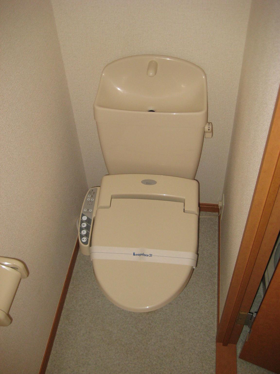 Toilet. It is a warm water washing toilet seat