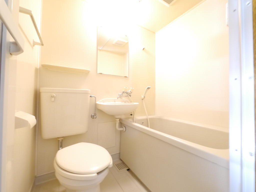 Bath. It is a clean bathroom