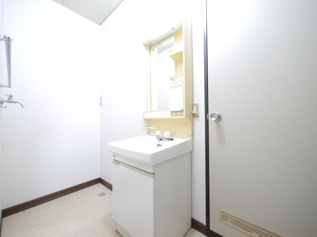 Washroom. Washing machine is put into