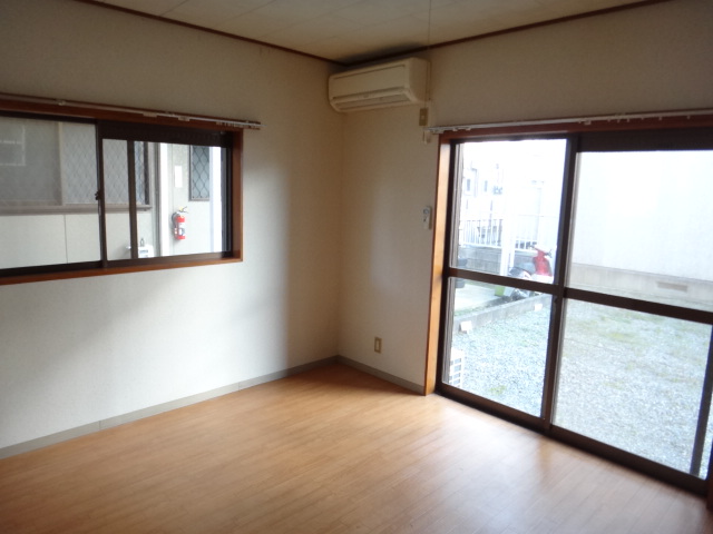 Living and room. Because it is a corner room is a two-sided lighting